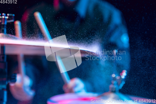 Image of Drummer\'s rehearsing on drums before rock concert. Man recording music on drumset in studio