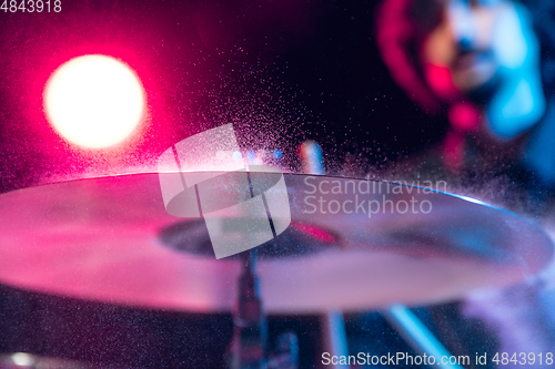 Image of Drummer\'s rehearsing on drums before rock concert. Man recording music on drumset in studio