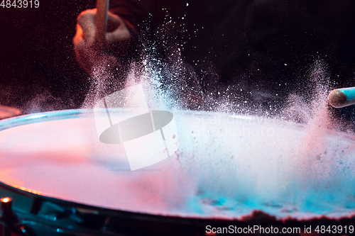 Image of Drummer\'s rehearsing on drums before rock concert. Man recording music on drumset in studio