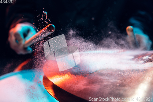 Image of Drummer\'s rehearsing on drums before rock concert. Man recording music on drumset in studio