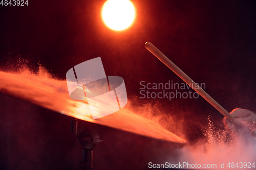 Image of Drummer\'s rehearsing on drums before rock concert. Man recording music on drumset in studio