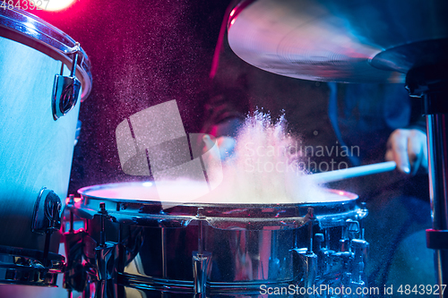 Image of Drummer\'s rehearsing on drums before rock concert. Man recording music on drumset in studio