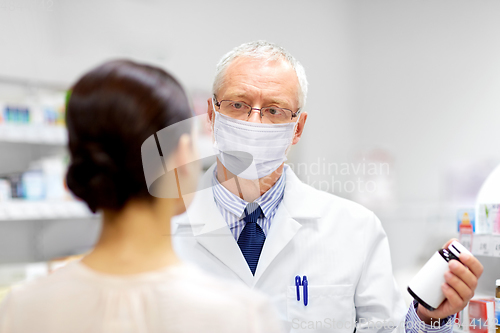 Image of apothecary in mask showing drug to customer