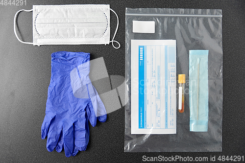 Image of test tube, medical report, gloves and mask