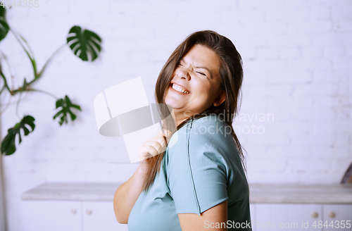 Image of Portrait of the happy plus size model