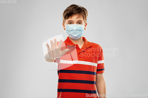 Image of boy in protective medical mask