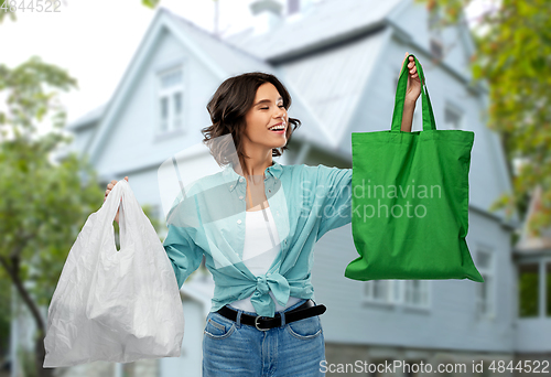 Image of woman with plastic and reusable shopping bag