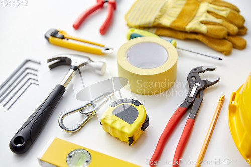 Image of different work tools on white background