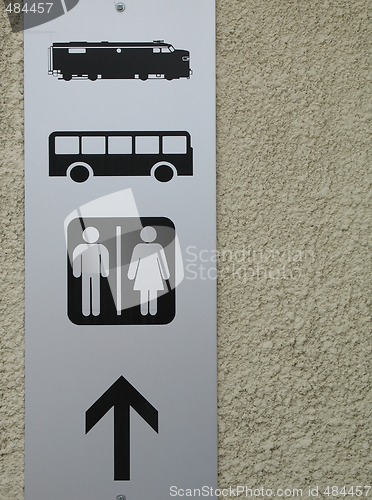 Image of bus, train and washroom sign