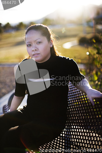 Image of Asian Woman Sitting