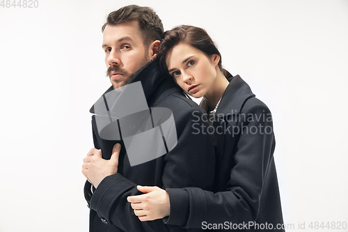 Image of Trendy fashionable couple isolated on white studio background