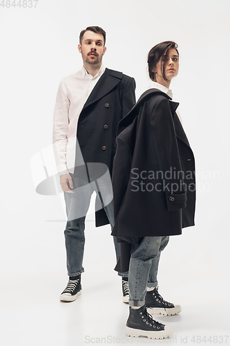 Image of Trendy fashionable couple isolated on white studio background