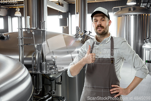 Image of Professional brewer on his own craft alcohol production