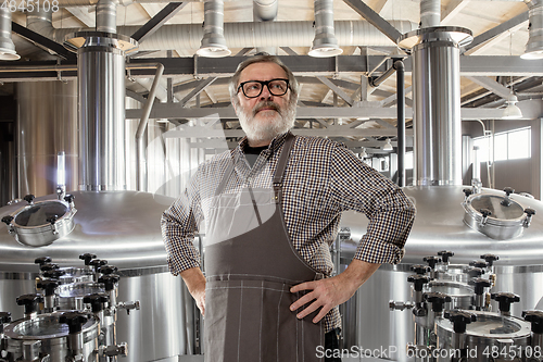 Image of Professional brewer on his own craft alcohol production