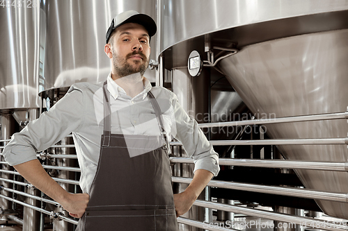 Image of Professional brewer on his own craft alcohol production