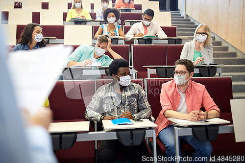 Image of group of students in masks at lecture hall