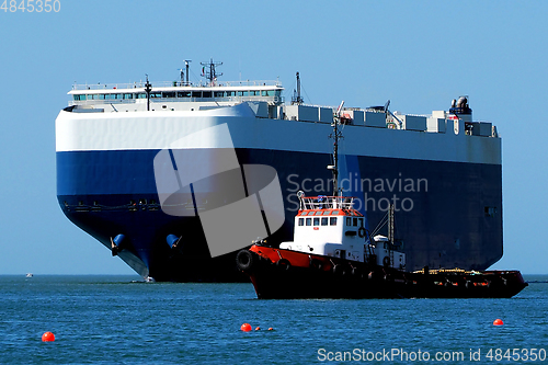 Image of Car Carrier & Tugboat