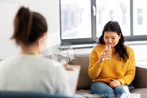 Image of young asian woman patient and psychologist