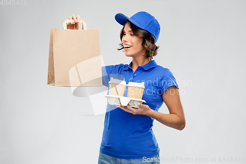 Image of delivery woman with takeaway food and drinks