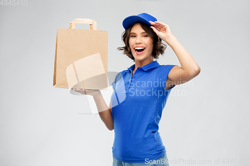 Image of delivery woman with takeaway food in paper bag