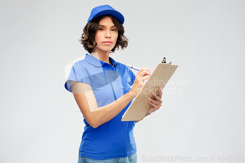 Image of delivery girl with clipboard and pen writing