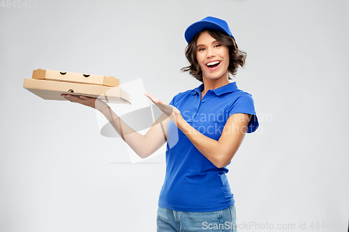 Image of delivery woman with takeaway pizza boxes