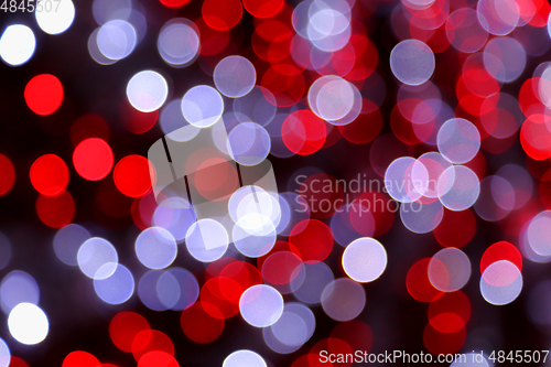 Image of Bright unfocused holiday color lights