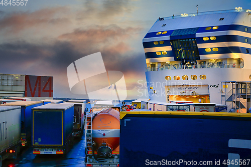 Image of Freight Transport Trucks Loading Onto Ferry