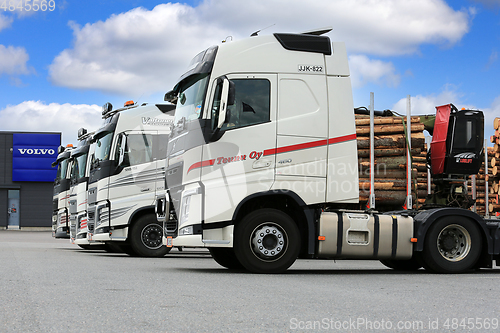 Image of Row of White Volvo FH Heavy Trucks 