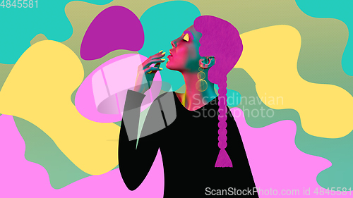 Image of Portrait of a beautiful young woman with bright colorful painted design