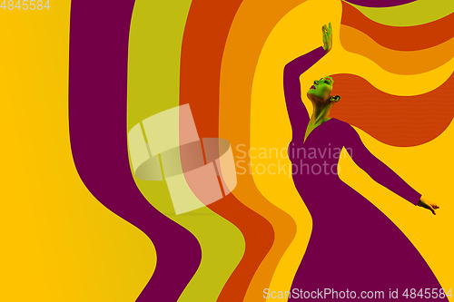 Image of Portrait of a beautiful young woman with bright colorful painted design