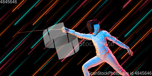 Image of Creative sport and neon lines on dark background, flyer, proposal