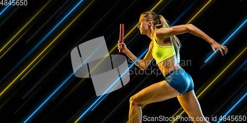 Image of Creative sport and neon lines on dark background, flyer, proposal