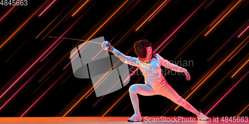 Image of Creative sport and neon lines on dark background, flyer, proposal