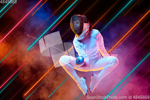 Image of Creative sport and neon lines on dark background, flyer, proposal