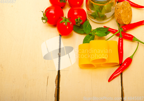 Image of Italian pasta paccheri with tomato mint and chili pepper