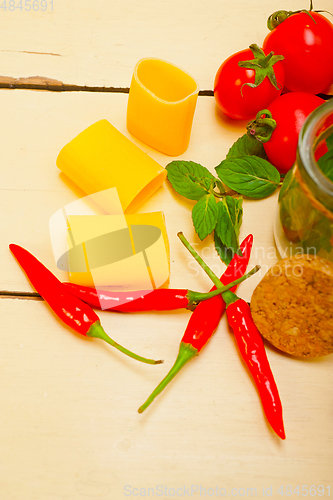 Image of Italian pasta paccheri with tomato mint and chili pepper