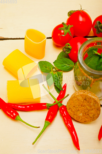 Image of Italian pasta paccheri with tomato mint and chili pepper