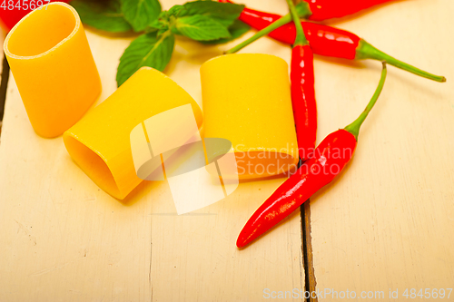 Image of Italian pasta paccheri with tomato mint and chili pepper