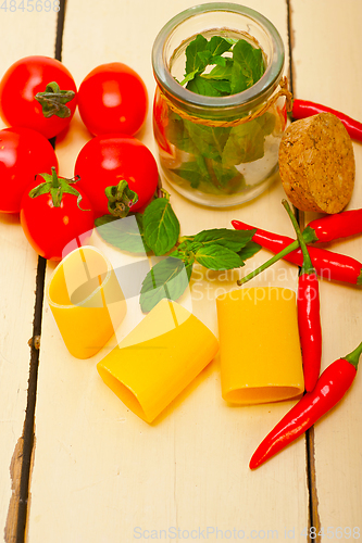 Image of Italian pasta paccheri with tomato mint and chili pepper