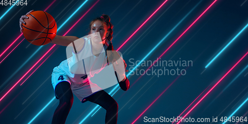 Image of Creative sport and neon lines on dark background, flyer, proposal