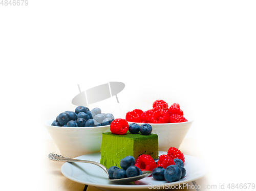 Image of green tea matcha mousse cake with berries