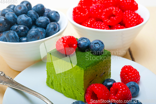 Image of green tea matcha mousse cake with berries