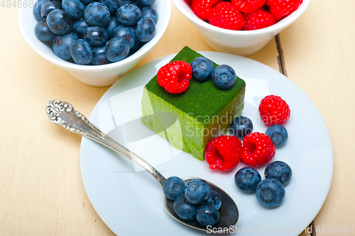 Image of green tea matcha mousse cake with berries