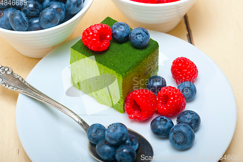 Image of green tea matcha mousse cake with berries