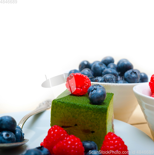 Image of green tea matcha mousse cake with berries
