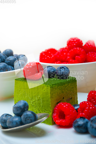 Image of green tea matcha mousse cake with berries