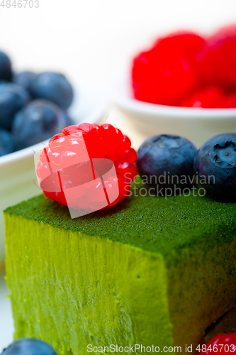 Image of green tea matcha mousse cake with berries
