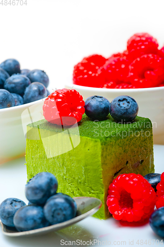 Image of green tea matcha mousse cake with berries