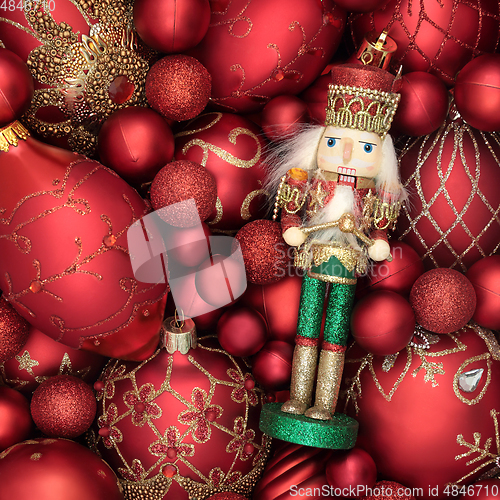 Image of Festive Christmas Nutcracker Toy Soldier and Sparkling Baubles